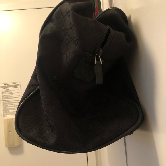 Gucci GG monogram duffle bag with signature straps